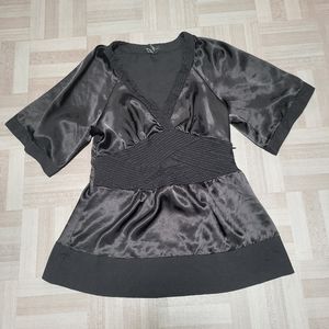 .BCBG MAXAZRIA dressy black top. Small